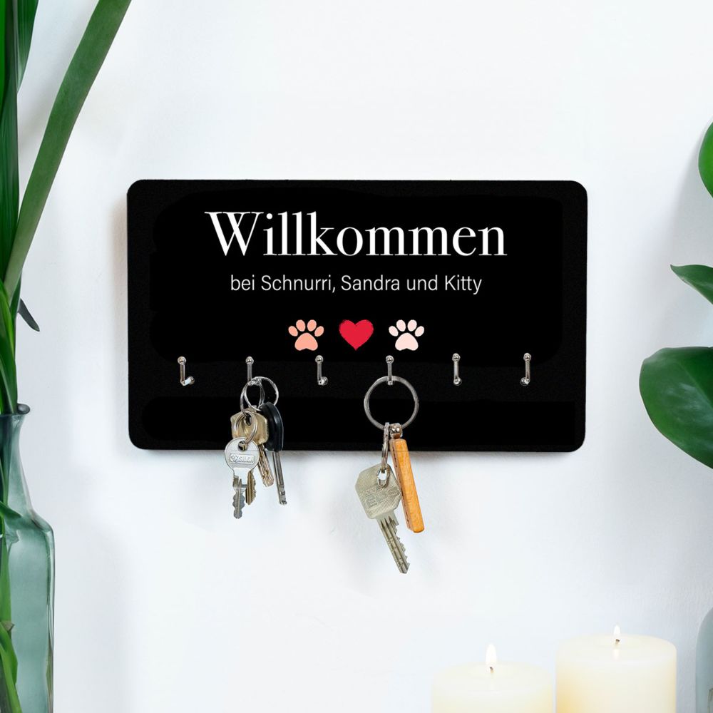 Personalisierbares Schlüsselbrett mit Symbolen und Namen