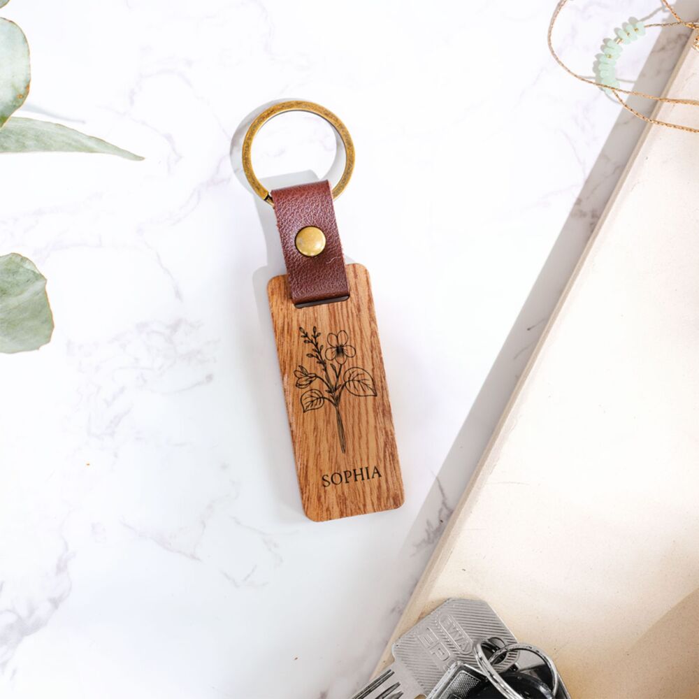 Personalisierter Schlüsselanhänger aus Holz mit Geburtsblume und Wunschdatum