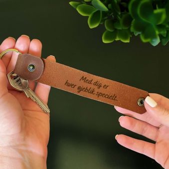 Personlig nøglering med en skjult besked