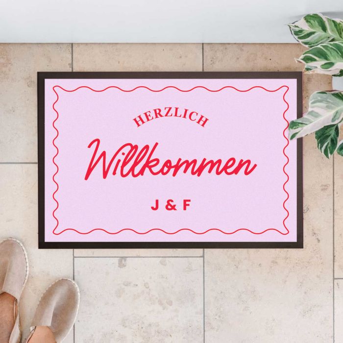 Personalisierbare Fußmatte mit farbigem Hintergrund und Text